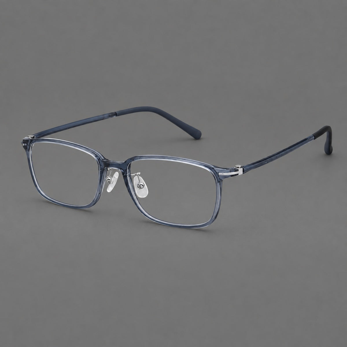 Low profile rectangular plastic eyeglasses with a straight browline and slim temples in Slate Blue, three quarter view