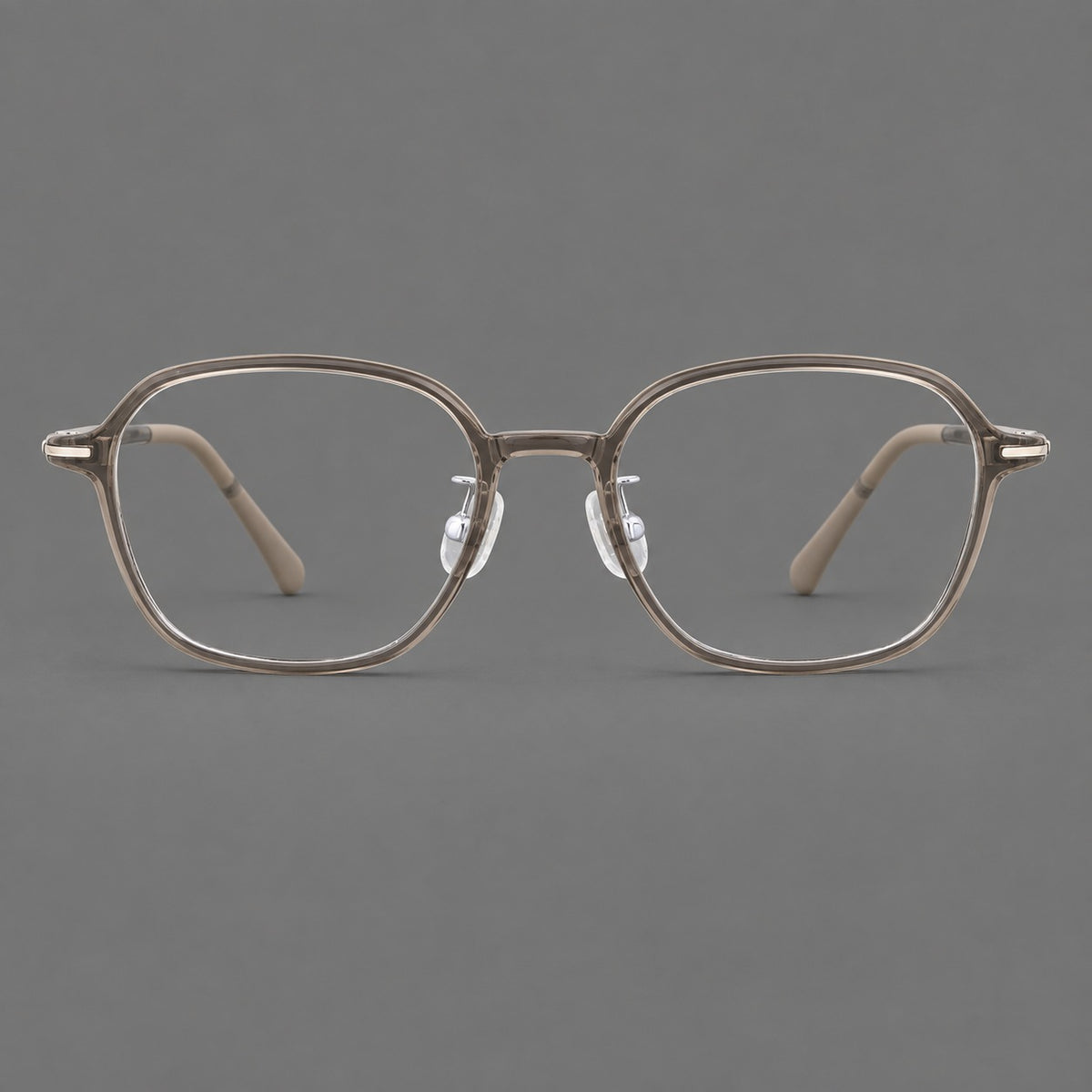Rounded geometric plastic eyeglasses with softly angled rims and a curved bridge in Twilight Grey Tea, front view