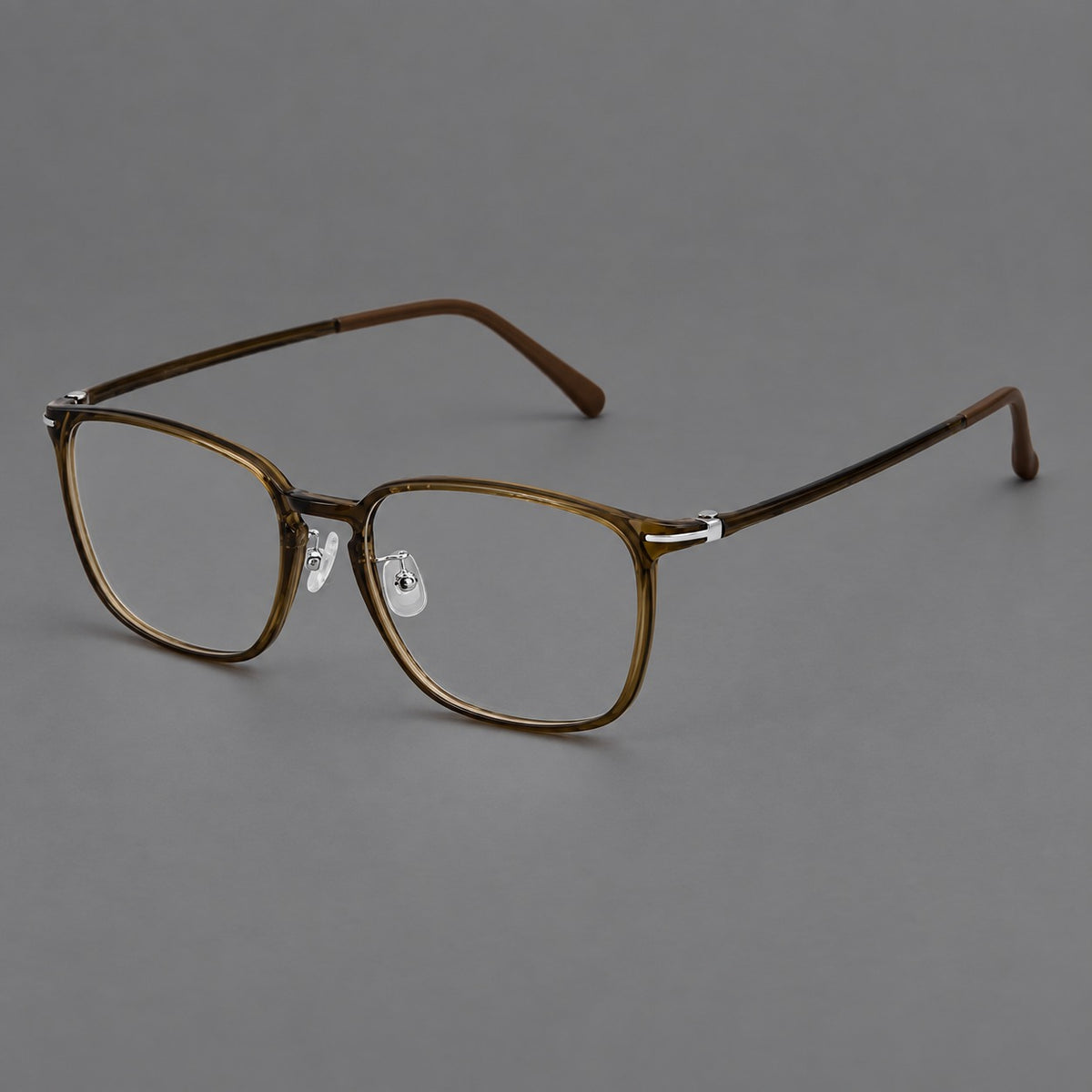Bold square plastic eyeglasses with a defined browline and an open bridge in Dark Brown, three quarter view