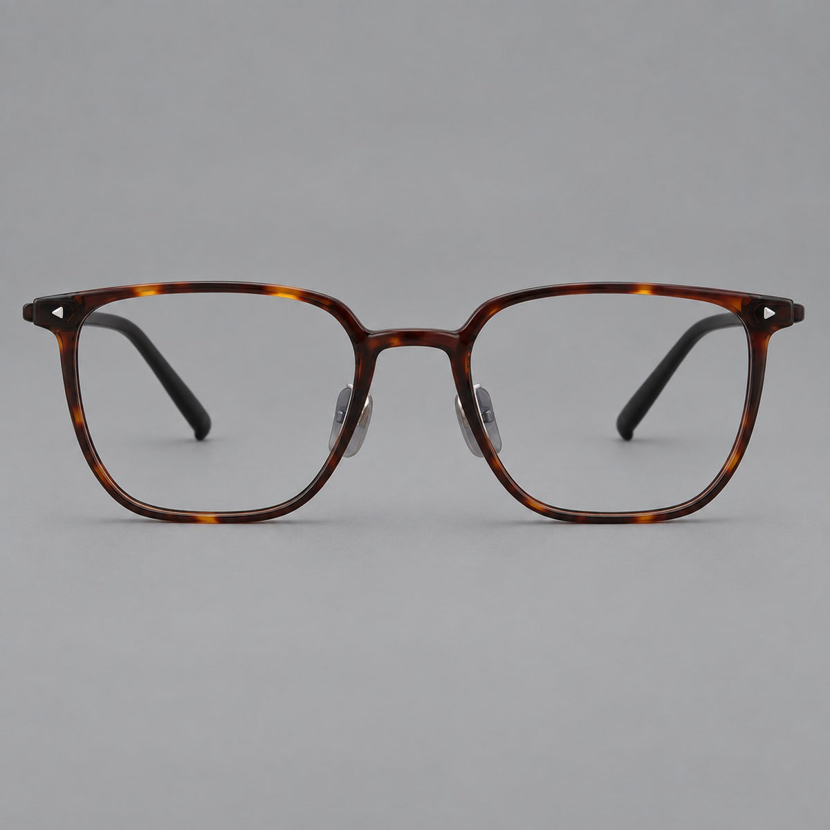 Refined rectangular plastic eyeglasses with raised outer corners and clear nose pads in Tortoiseshell, front view