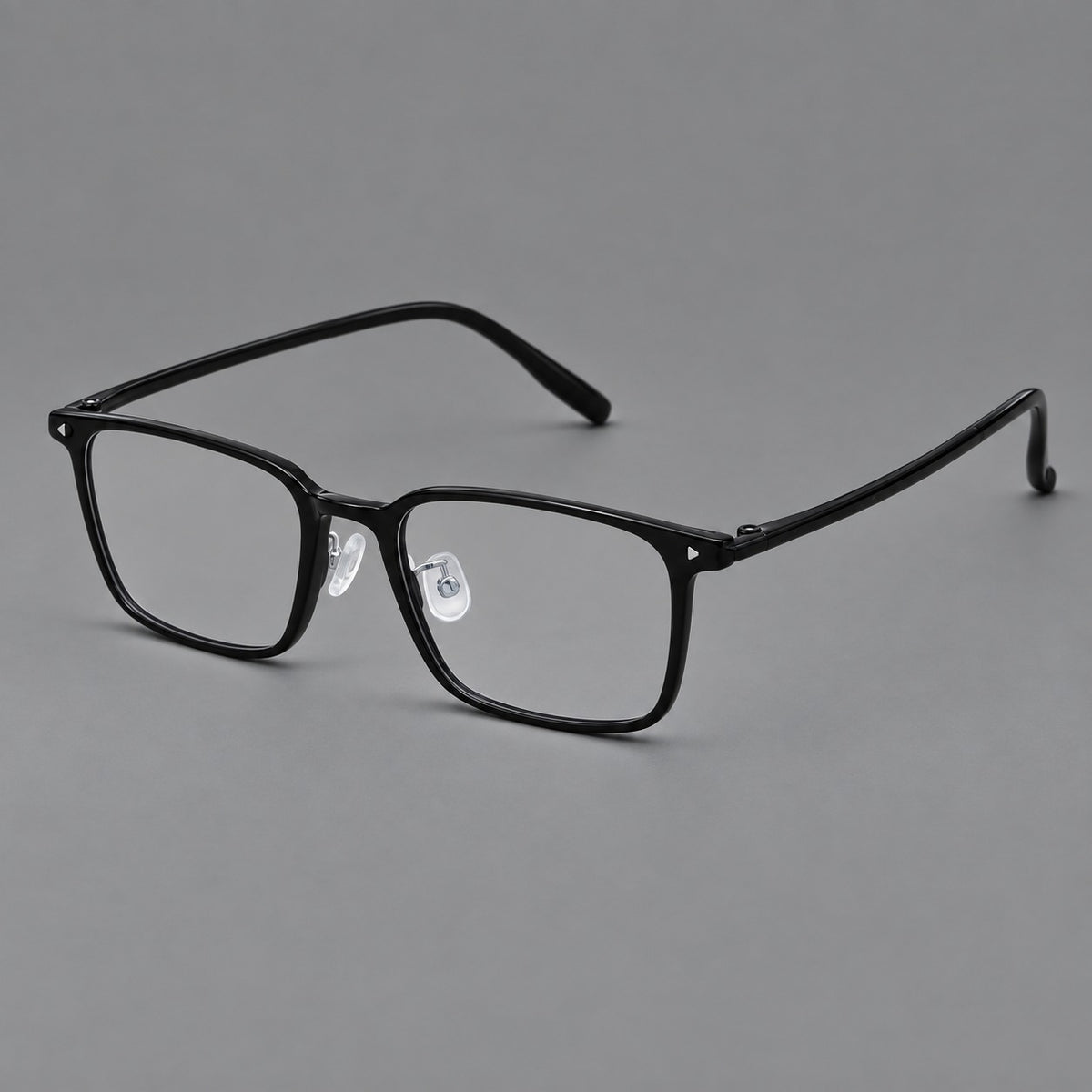 Everyday rectangular plastic eyeglasses with rounded edges and a narrow bridge in Glossy Black, three quarter view
