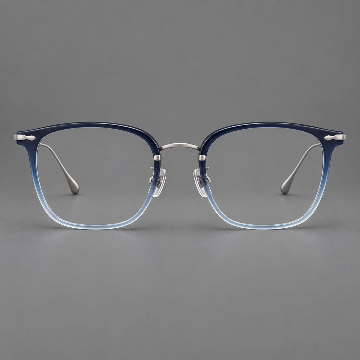 Retro square eyeglasses in acetate and titanium with rounded edges and sculpted corner accents in Blue Gradient / Silver, front view