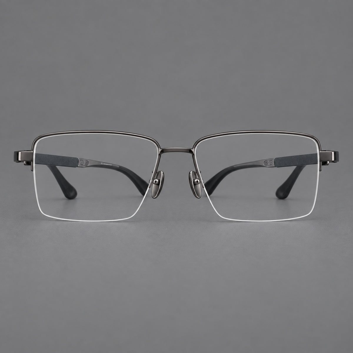 Wide half frame titanium glasses with rectangular lenses and textured temples in Gunmetal, front view