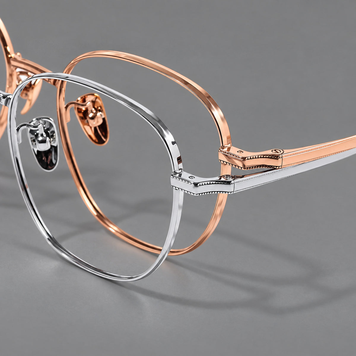 Retro panto titanium glasses with stepped corners and finely engraved temples, frame details