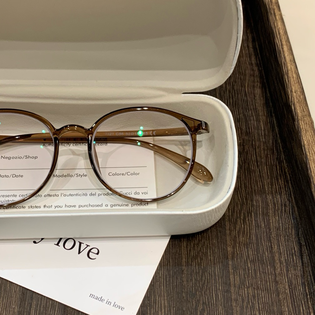 Round Eyeglass Frames with Thin Rims and a Curved Brow, Cool Tea Brown