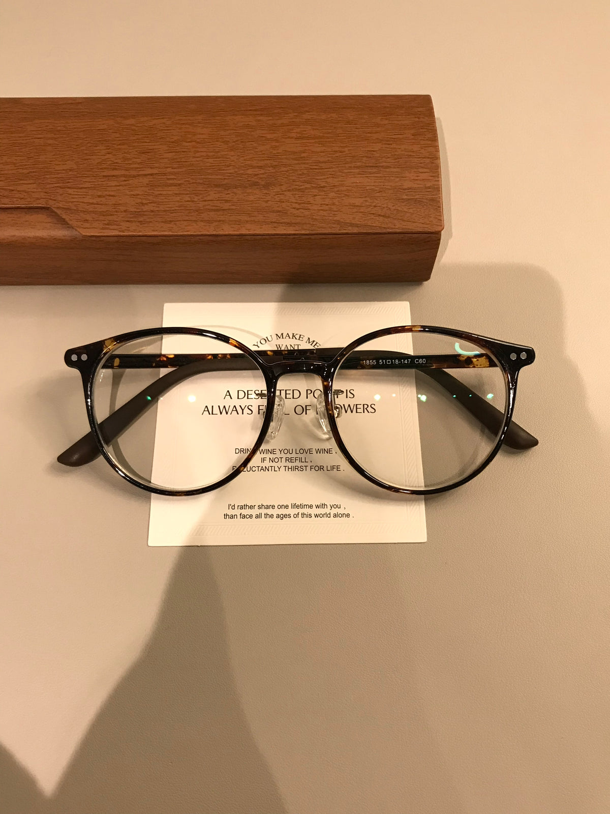 Retro Rounded Eyeglass Frames with a Raised Bridge, Tortoiseshell and Solid Colors
