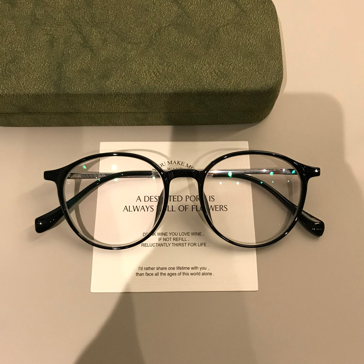 Round Eyeglass Frames with a Keyhole-Style Bridge, Black or Transparent Tea Brown