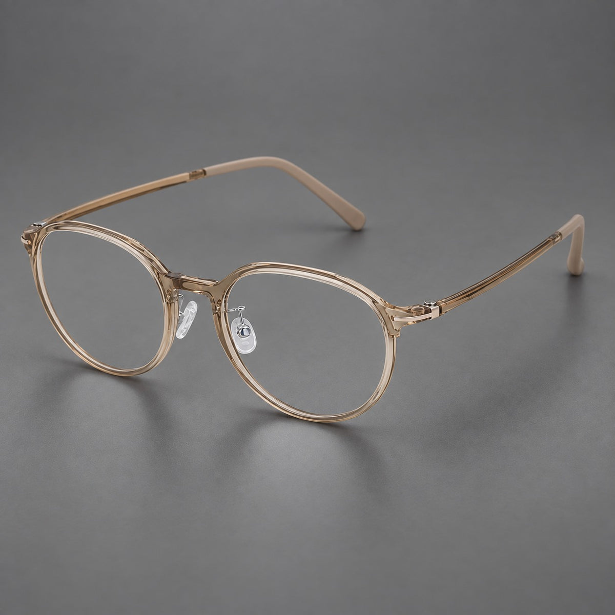 Retro round plastic eyeglasses with a curved bridge and slim metal corner accents in Tea, three quarter view