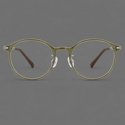Compact round plastic eyeglasses with gently lifted corners and clear nose pads in Iced Green Tea, front view additional product view