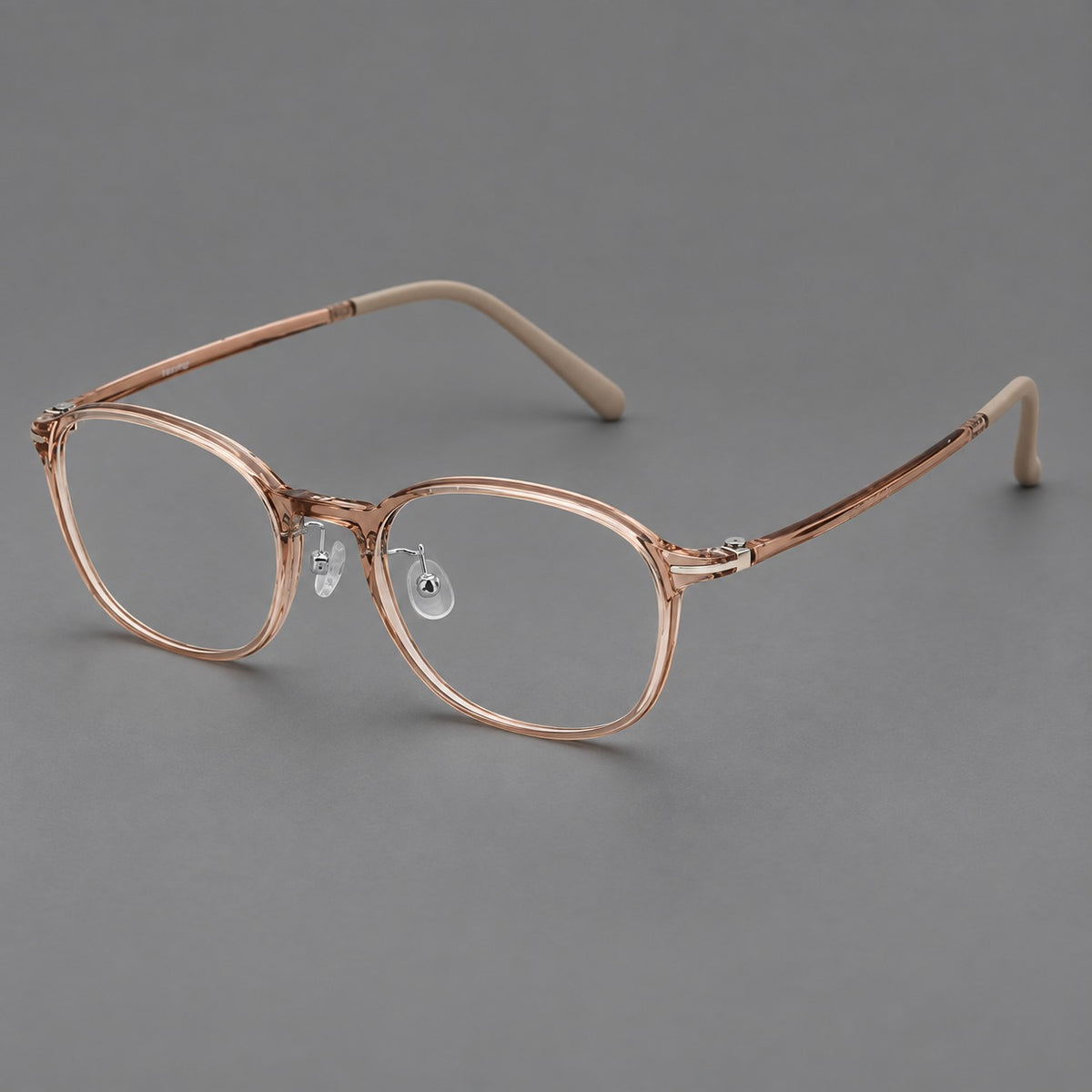 Soft square plastic eyeglasses with a raised browline and rounded lower corners in Amber Tea, three quarter view