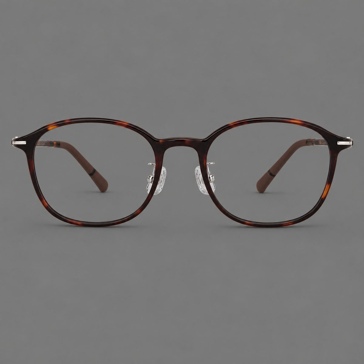 Soft square plastic eyeglasses with a raised browline and rounded lower corners in Tortoiseshell, front view