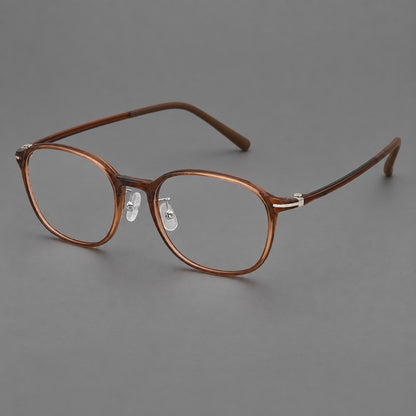 Soft square plastic eyeglasses with a raised browline and rounded lower corners in Milk Tea Brown, three quarter view lens detail