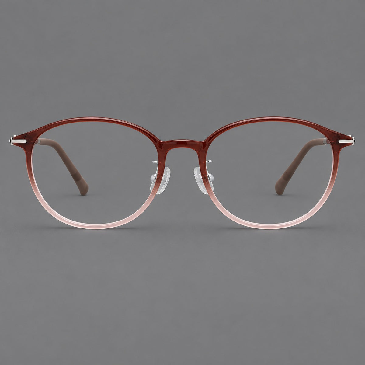 Slim oval plastic eyeglasses with a low profile and subtle metal corner accents in Red Brown Gradient, front view