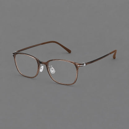 Classic square plastic eyeglasses with broad lenses and softly rounded edges in Ink Brown, three quarter view lens detail