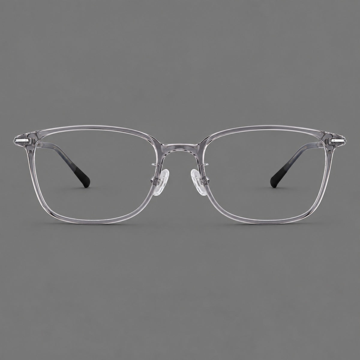 Classic square plastic eyeglasses with broad lenses and softly rounded edges in Clear Grey, front view