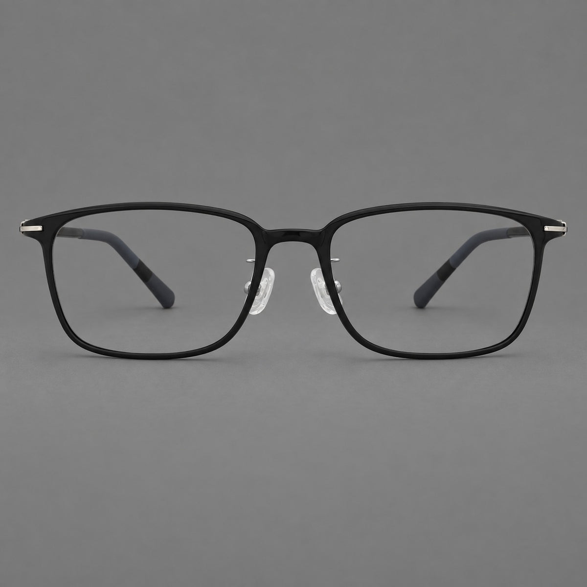 Low profile rectangular plastic eyeglasses with a straight browline and slim temples in Matte Black, front view