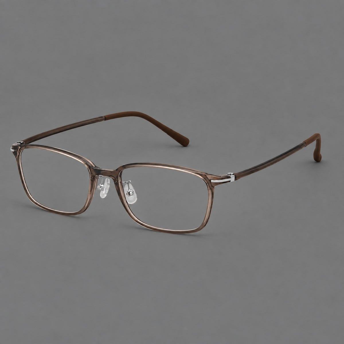 Low profile rectangular plastic eyeglasses with a straight browline and slim temples in Ink Brown, three quarter view