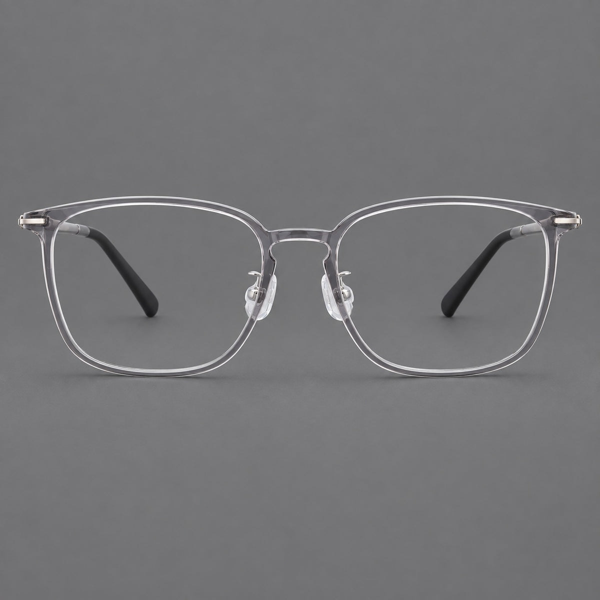 Bold square plastic eyeglasses with a defined browline and an open bridge in Clear Grey, front view