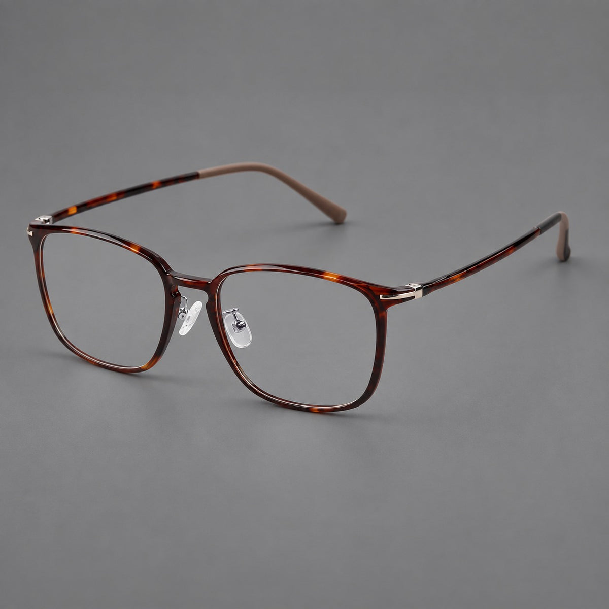 Bold square plastic eyeglasses with a defined browline and an open bridge in Tortoiseshell, three quarter view