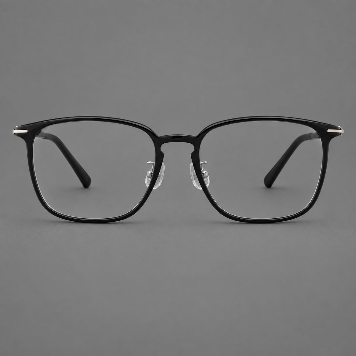 Bold square plastic eyeglasses with a defined browline and an open bridge in Glossy Black, front view