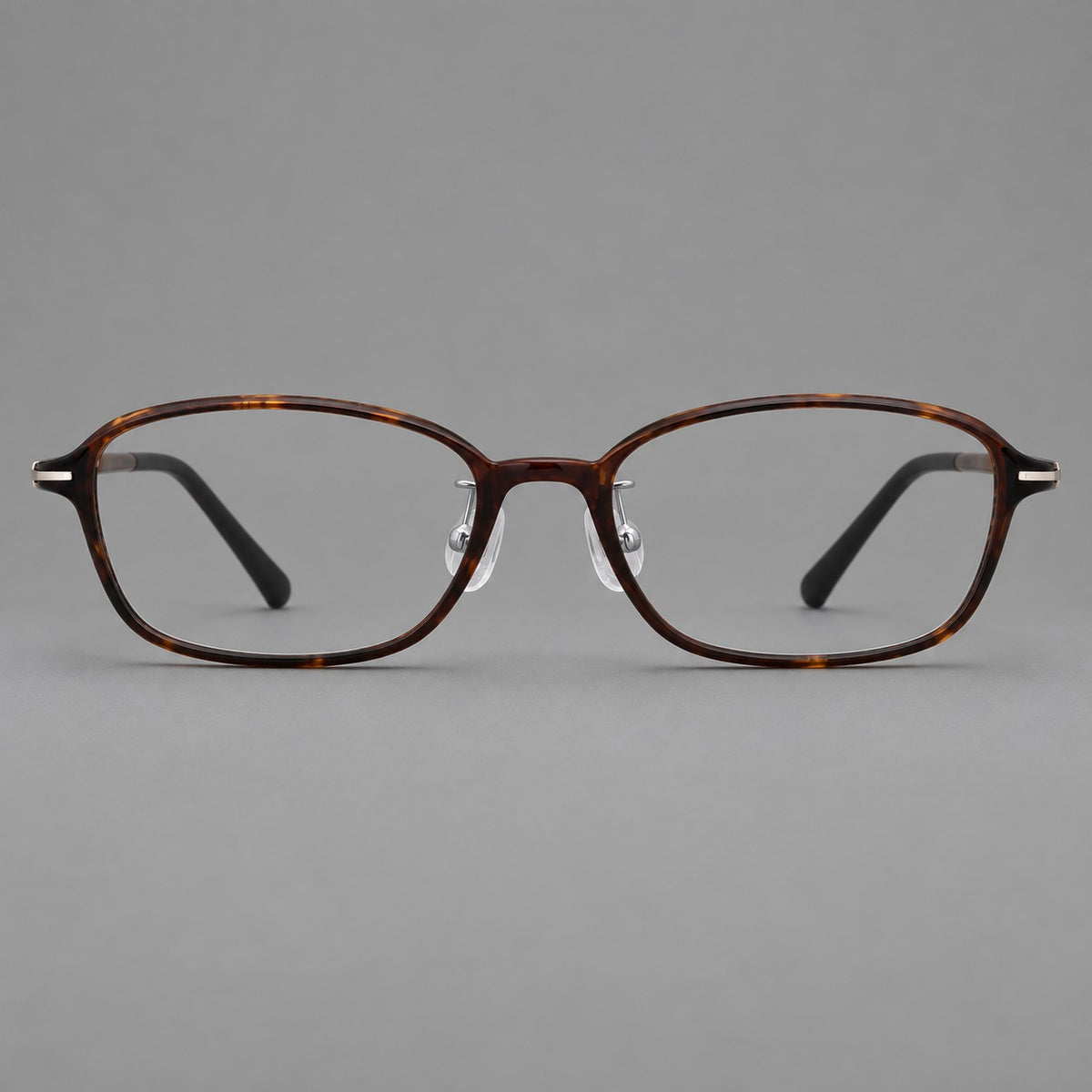 Soft oval plastic eyeglasses with a narrow bridge and gently rounded outer corners in Tortoiseshell, front view