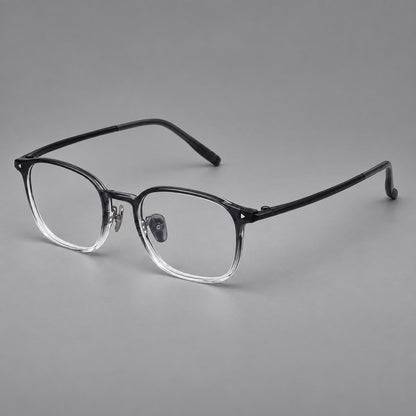 Retro square plastic eyeglasses with a curved bridge and triangular corner details in Ink Grey Gradient, three quarter view lens detail