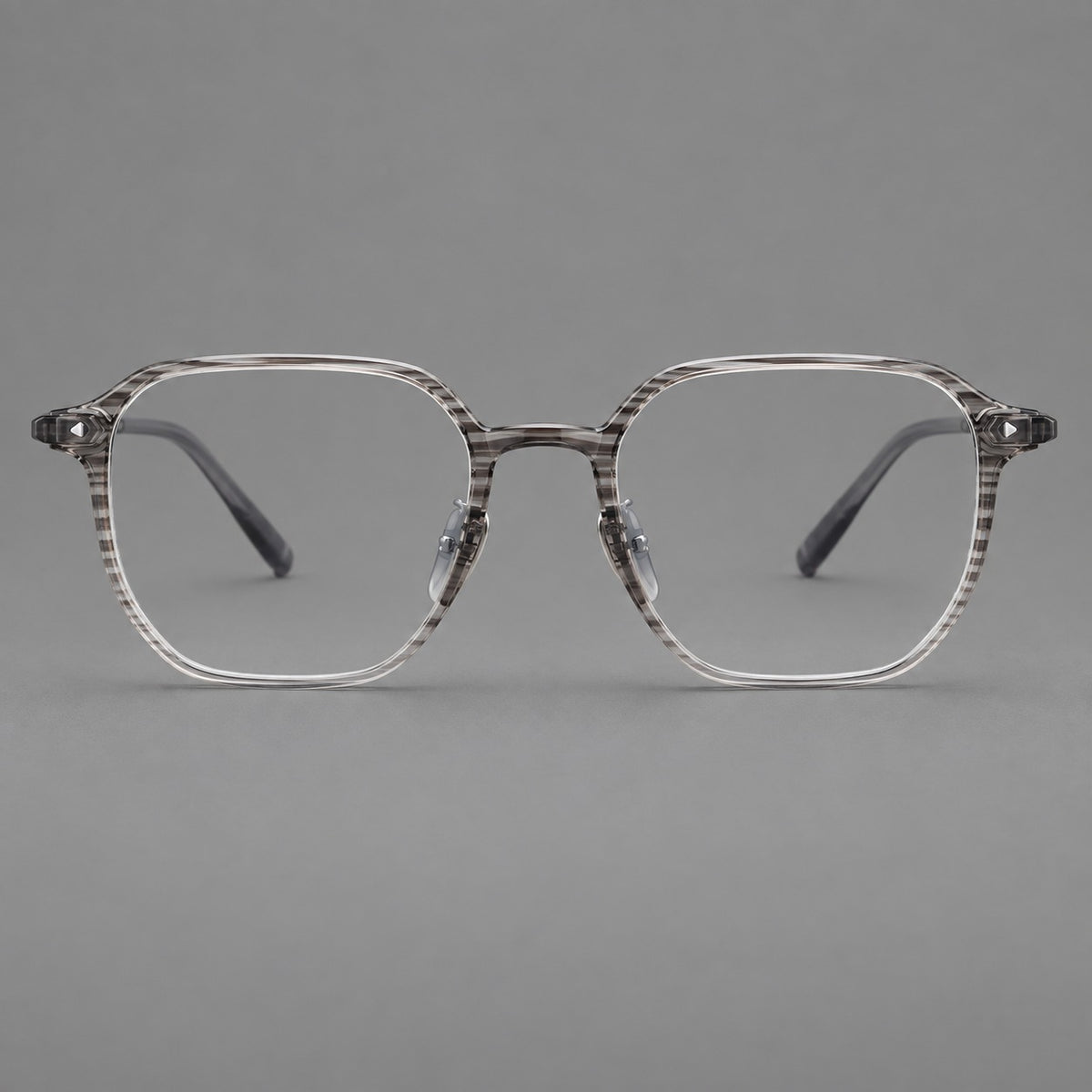 Soft square plastic eyeglasses with rounded lower rims and a broad curved bridge in Striped Grey Gradient, front view