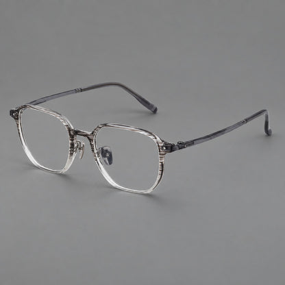 Soft square plastic eyeglasses with rounded lower rims and a broad curved bridge in Striped Grey Gradient, three quarter view lens detail