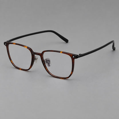 Refined rectangular plastic eyeglasses with raised outer corners and clear nose pads in Tortoiseshell, three quarter view additional product view