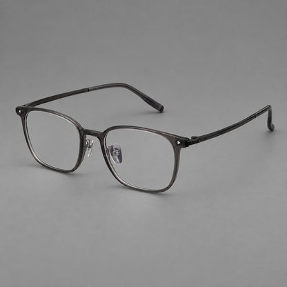 Classic soft square plastic eyeglasses with a gently curved browline and corner studs in Dark Grey, three quarter view front view