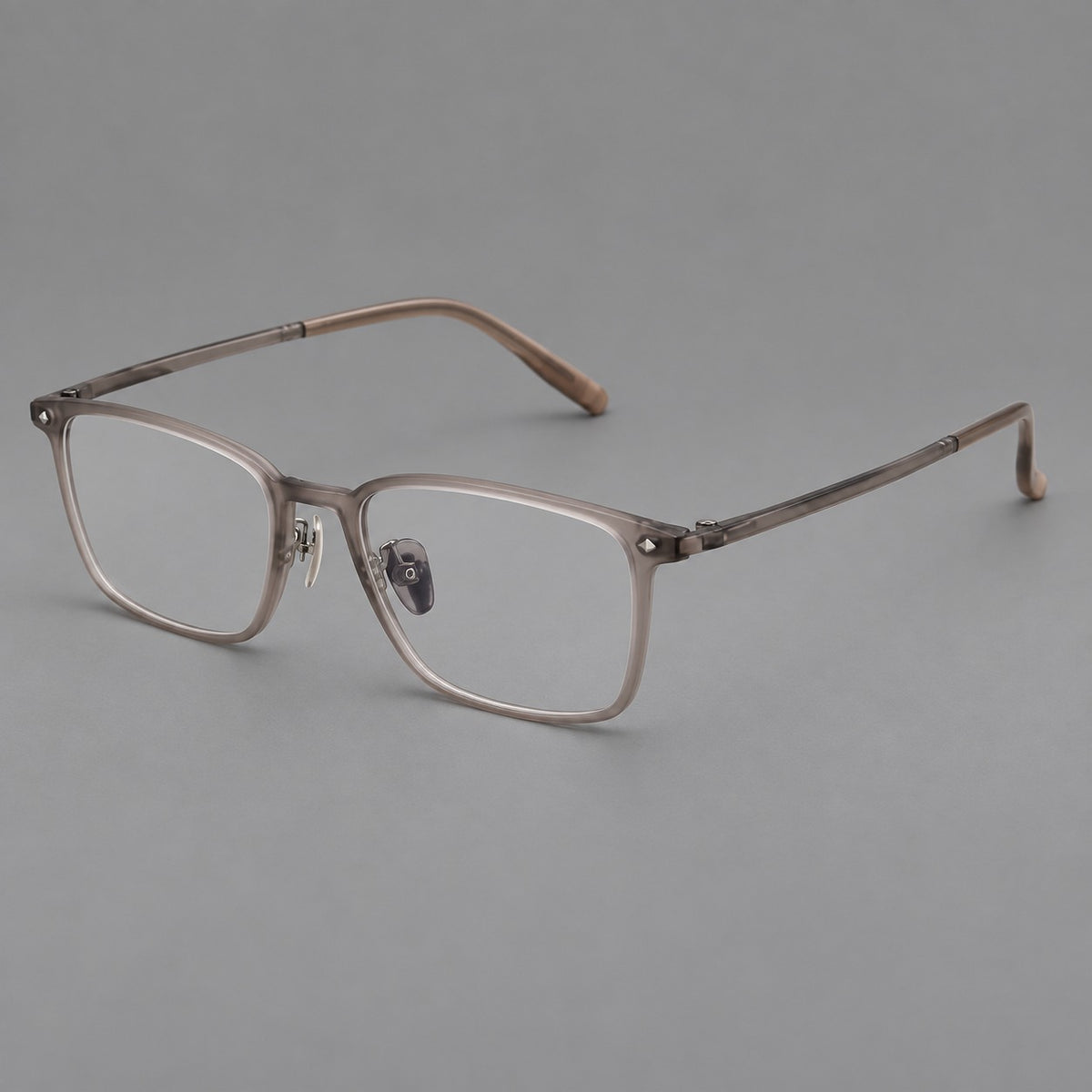 Clean rectangular plastic eyeglasses with flat lower rims and pointed corner details in Matte Tea, three quarter view