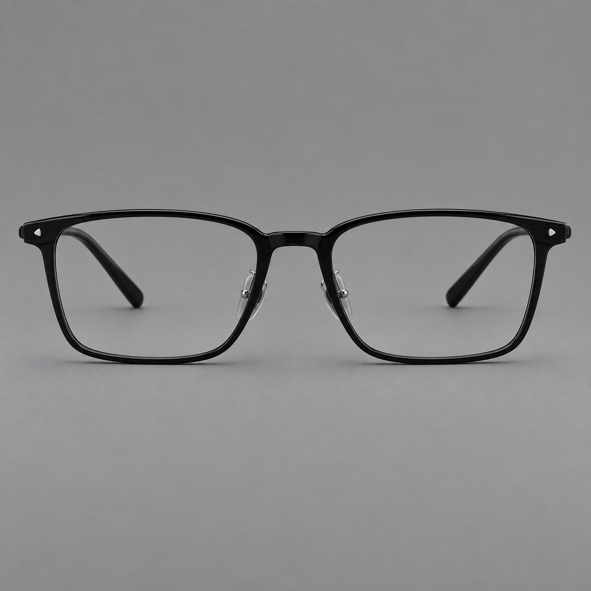 Clean rectangular plastic eyeglasses with flat lower rims and pointed corner details in Glossy Black, front view