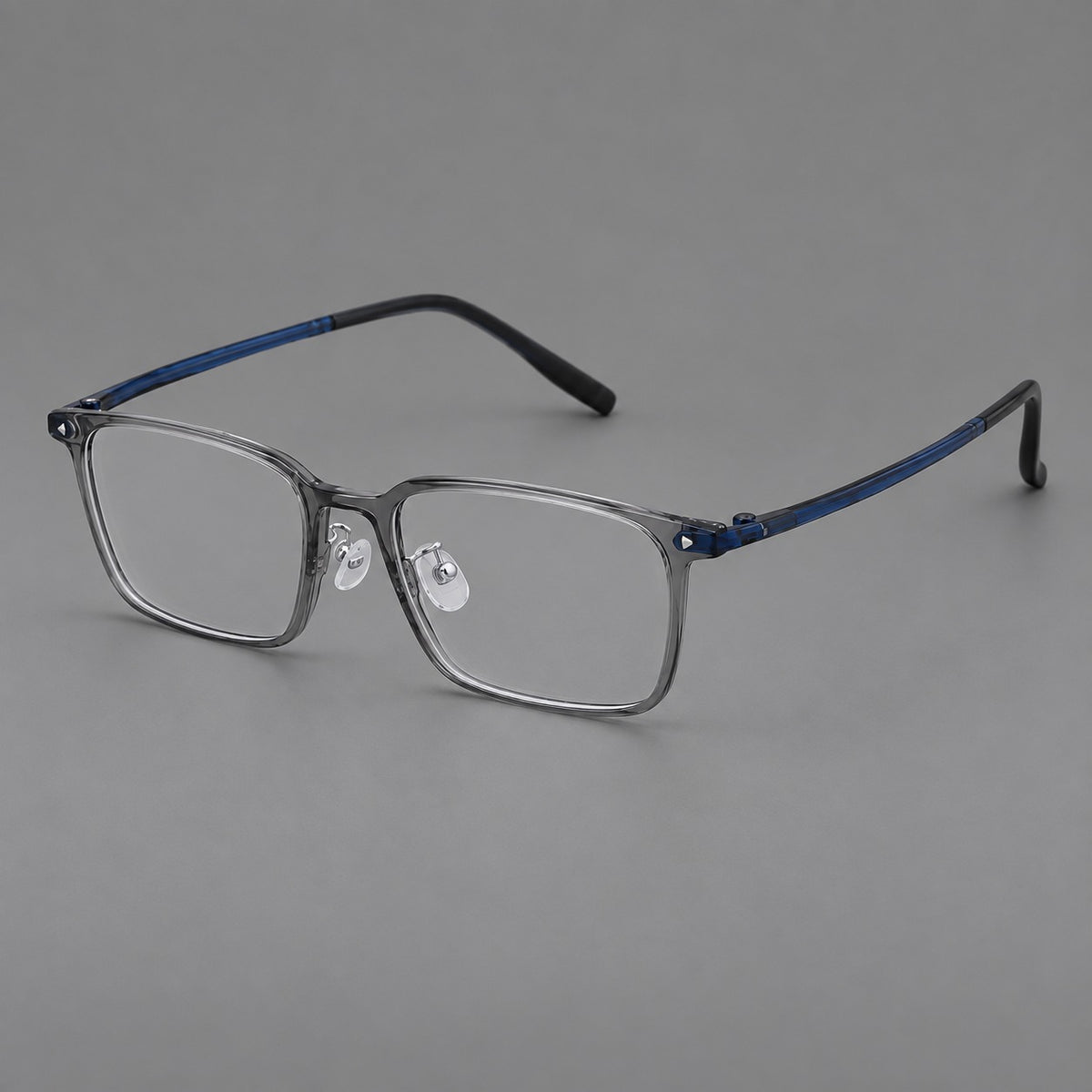 Everyday rectangular plastic eyeglasses with rounded edges and a narrow bridge in Medium Grey, three quarter view