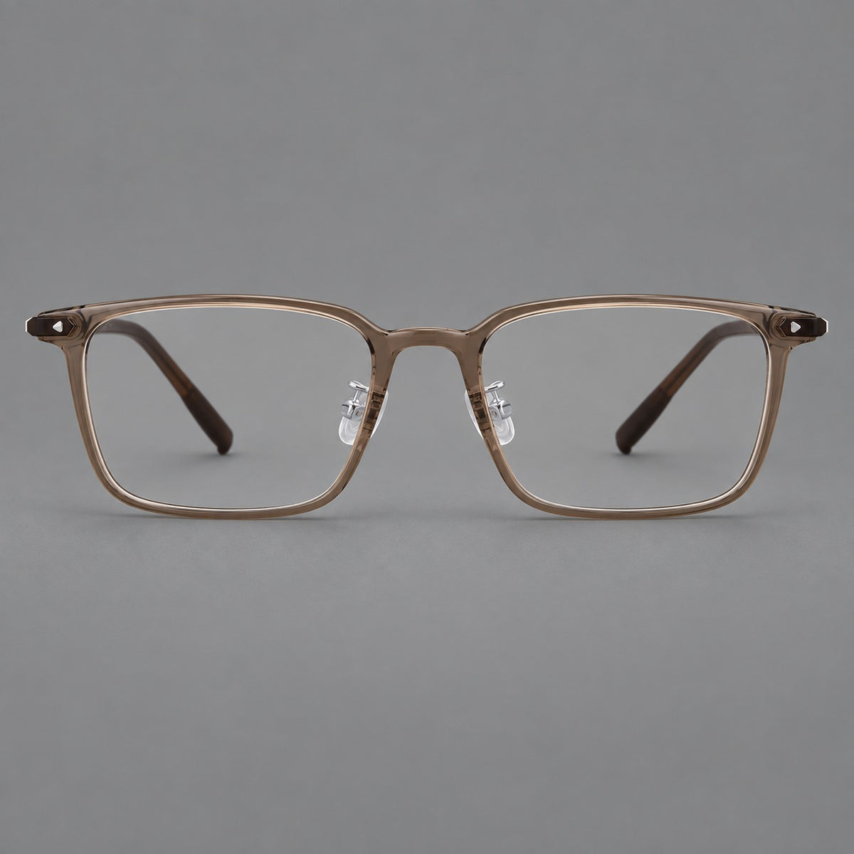 Everyday rectangular plastic eyeglasses with rounded edges and a narrow bridge in Brown, front view