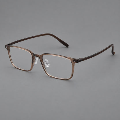 Everyday rectangular plastic eyeglasses with rounded edges and a narrow bridge in Brown, three quarter view lens detail