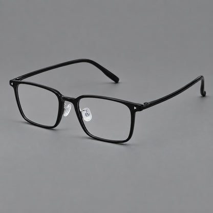 Everyday rectangular plastic eyeglasses with rounded edges and a narrow bridge in Glossy Black, three quarter view