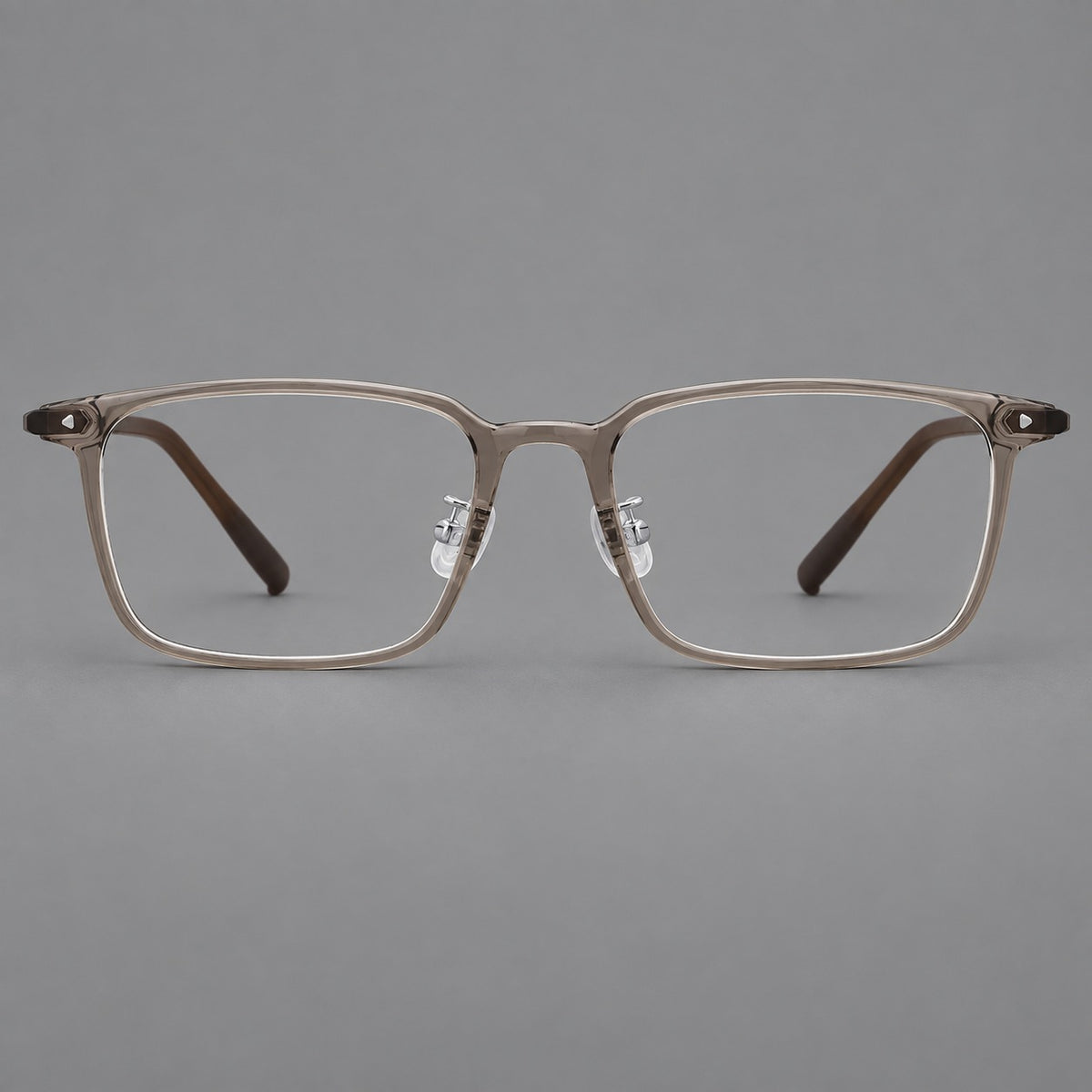 Everyday rectangular plastic eyeglasses with rounded edges and a narrow bridge in Grey Brown, front view