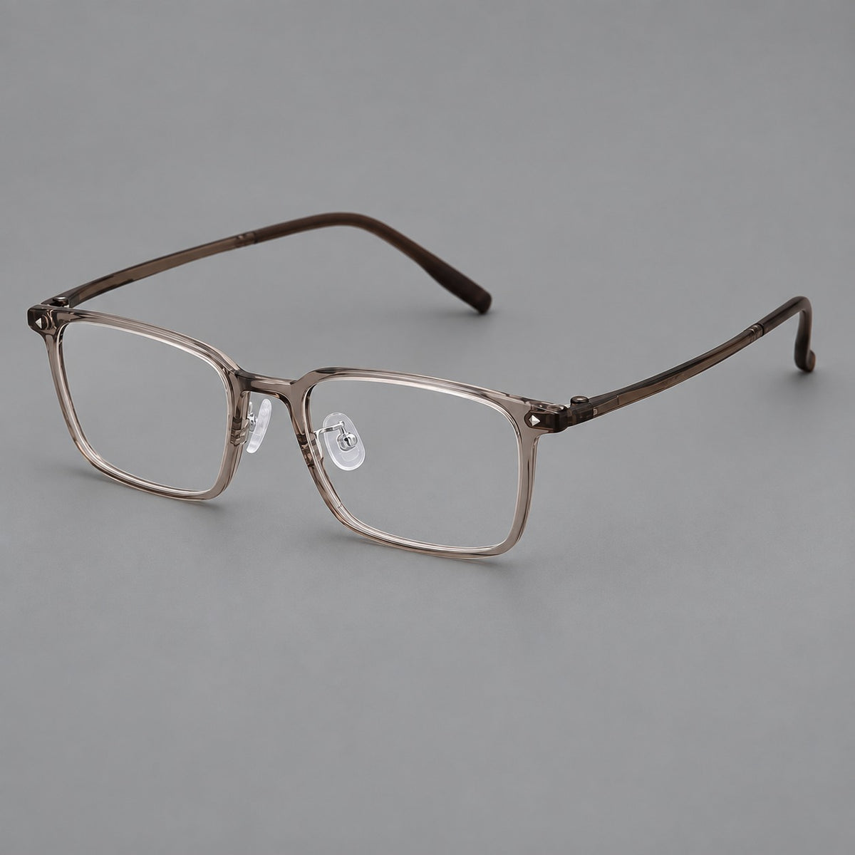 Everyday rectangular plastic eyeglasses with rounded edges and a narrow bridge in Grey Brown, three quarter view