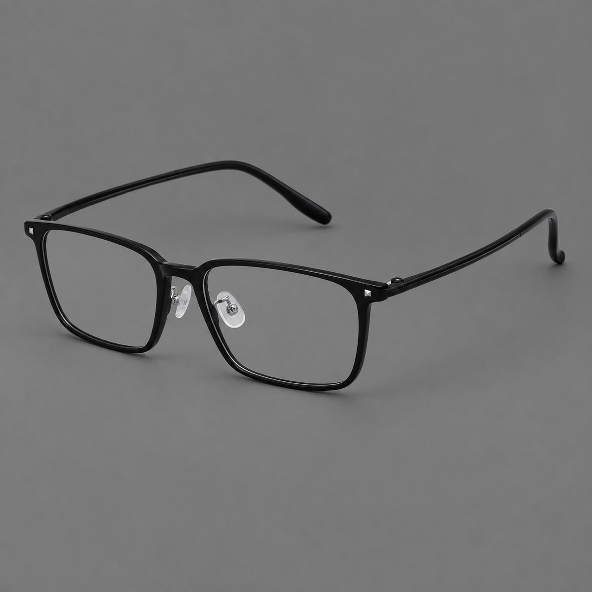 Wide rectangular plastic eyeglasses with an angular browline and slender rims in Glossy Black, three quarter view