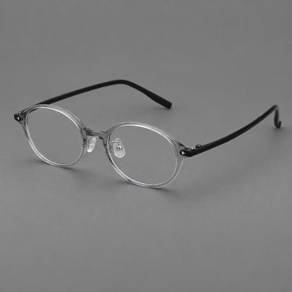 Retro round plastic eyeglasses with softly lifted corners and a sculpted bridge in Grey, three quarter view front view
