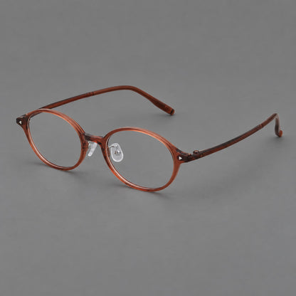 Retro round plastic eyeglasses with softly lifted corners and a sculpted bridge in Brown Red, three quarter view lens detail
