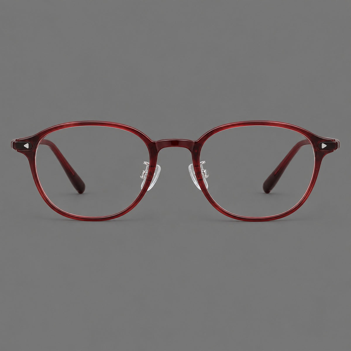 Panto plastic eyeglasses with a rounded silhouette and triangular corner studs in Burgundy, front view