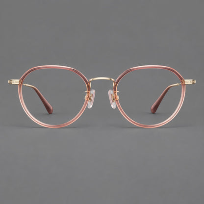 Rounded eyeglasses in acetate and titanium with gently arched brows and engraved metal temples in Amber Pink / Gold, front view side view