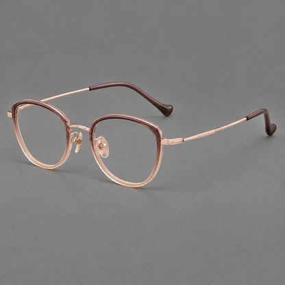 Upswept eyeglasses in acetate and titanium with softly rounded rims and tapered metal temples in Pink Tea Gradient / Rose Gold, three quarter view front view