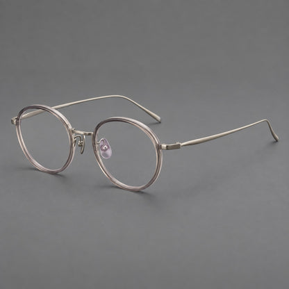 Classic round eyeglasses in acetate and titanium with slim rims and textured metal temples in Grey Pink Gradient / Gunmetal, three quarter view lens detail