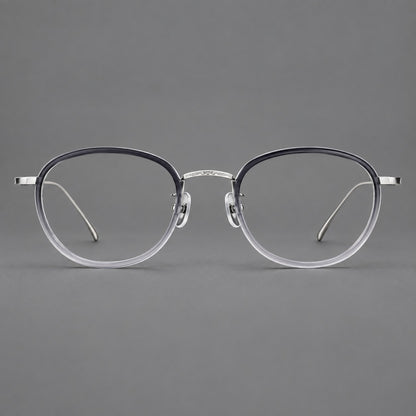 Vintage round eyeglasses in acetate and titanium with an engraved bridge and slender temples in Grey Gradient / Silver, front view frame detail