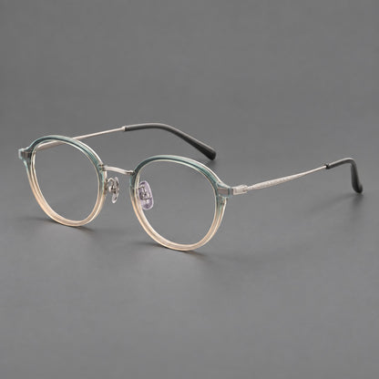 Softly rounded eyeglasses in acetate and titanium with a curved bridge and engraved temples in Green Tea Gradient / Silver, three quarter view additional product view