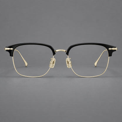 Browline eyeglasses in acetate and titanium with slim metal lower rims and decorative corners in Glossy Black / Gold, front view additional product view