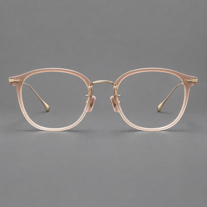 Panto eyeglasses in acetate and titanium with curved brows and decorative metal corner accents in Nude Pink / Gold, front view side view