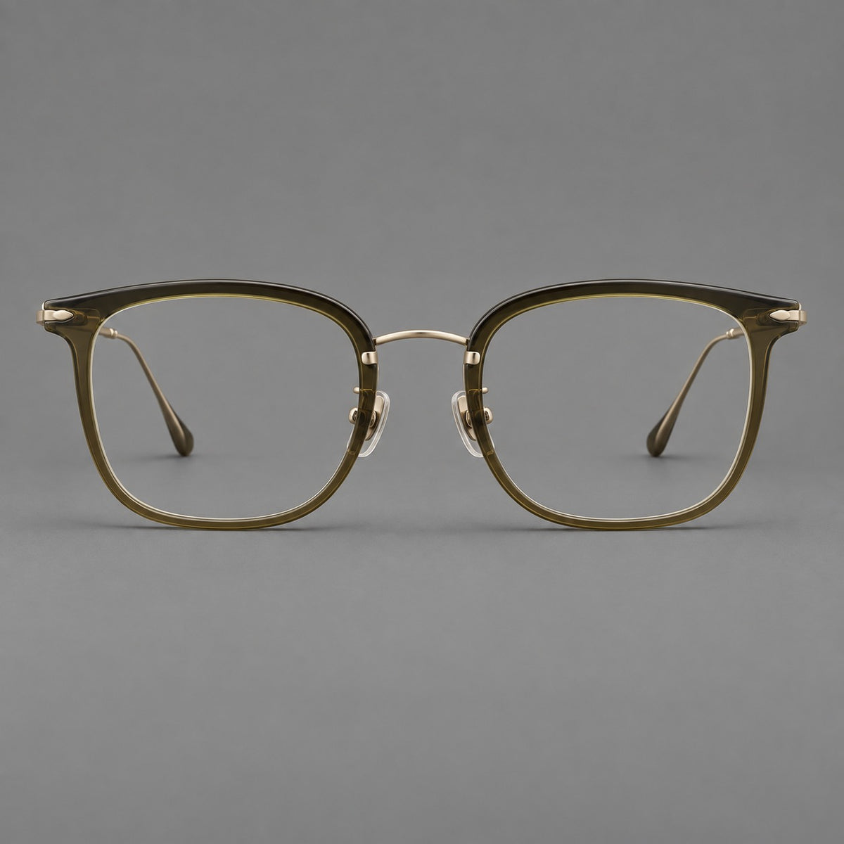 Retro square eyeglasses in acetate and titanium with rounded edges and sculpted corner accents in Green / Antique Bronze, front view